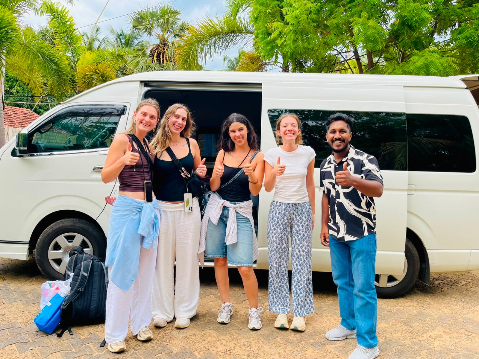 Happy travelers with our tour guide before an adventure